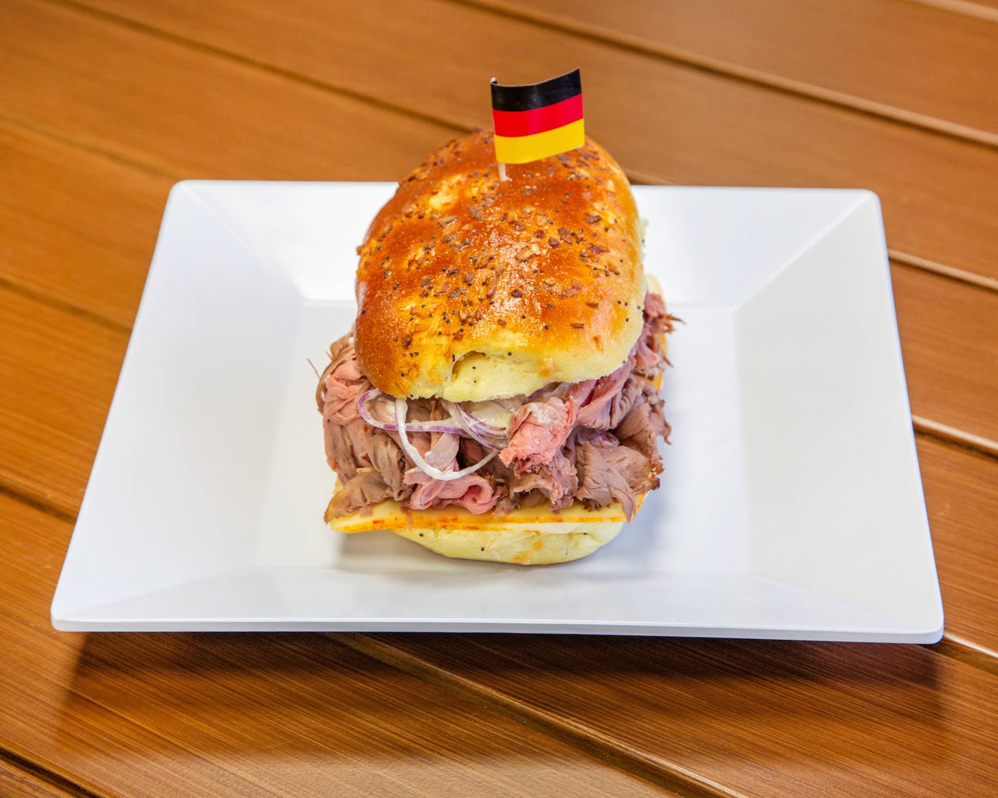A generous roast beef sandwich on a seasoned roll, photographed by Terrible Eddie’s